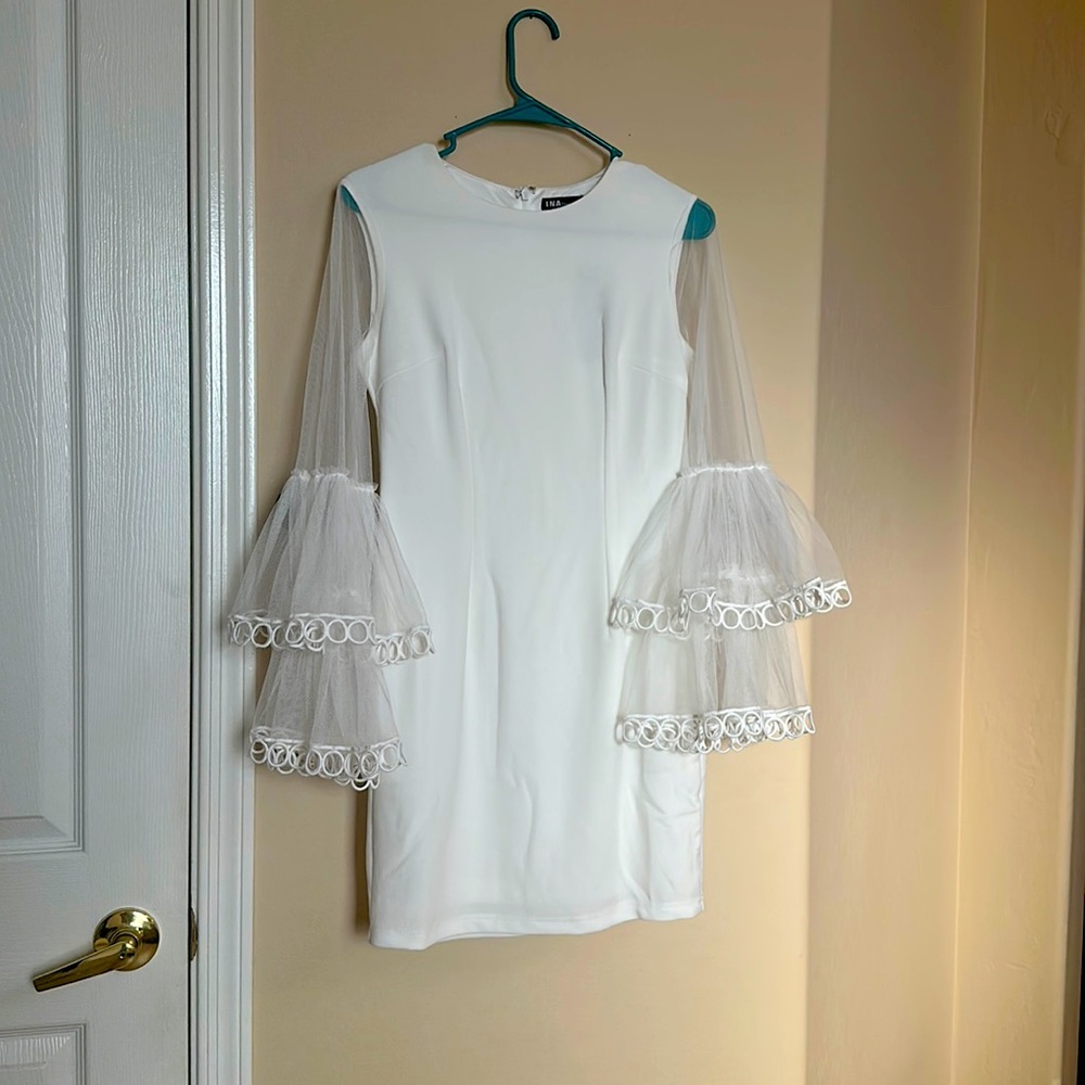 Ina white mini dress! NWT! Bell sleeves with ornate loops!